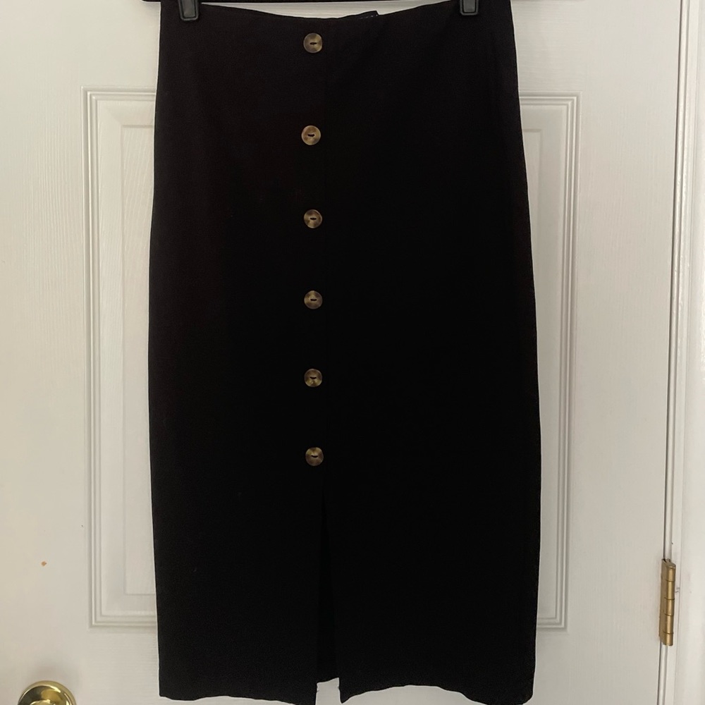 Sleek pencil skirt with buttons down the front.